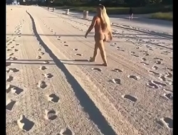 Naked Chick Walking On The Beach