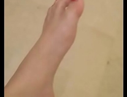 my girlfriend throws ice-cream on her feet